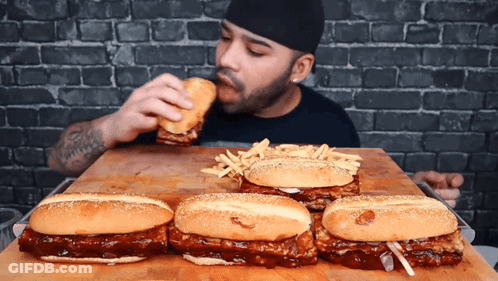 Man Eating Hamburgers And French Fries GIF