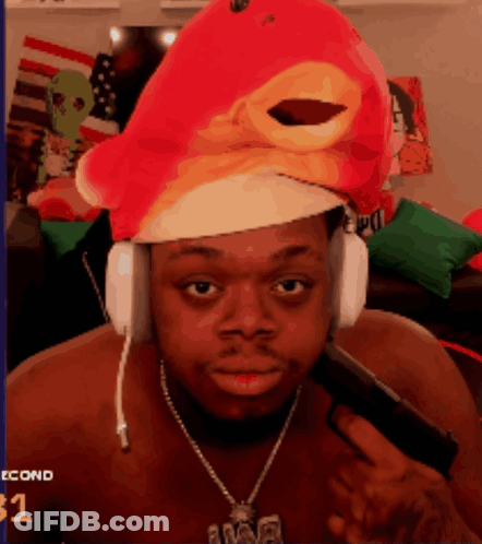 Man Eating Hot Dog In Dirty Harry Hoodie GIF