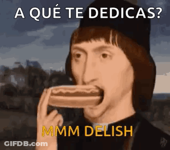 Man Eating Hot Dog Que Te Dedicas GIF