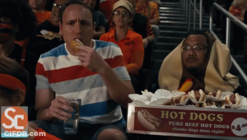 Man Eating Hot Dogs Champion GIF