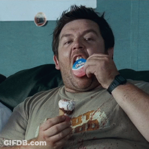 Man Eating Ice Cream Cone With Condom Saying Cornito GIF