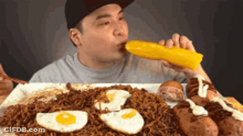 Man Eating Large Breakfast GIF