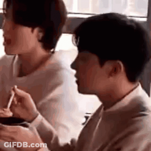 Man Eating Large Crab GIF