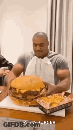 Man Eating Large Hamburger GIF