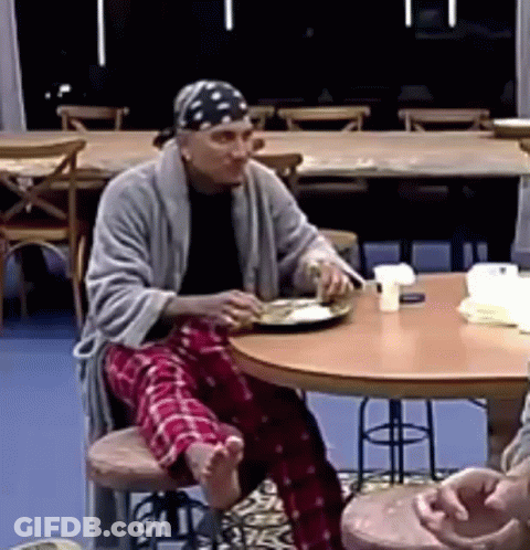 Man Eating Meal At Table GIF