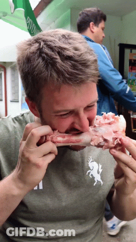 Man Eating Meat With Deer Shirt GIF