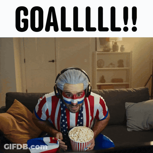 Man Eating Popcorn Wearing Headphones Goallll GIF