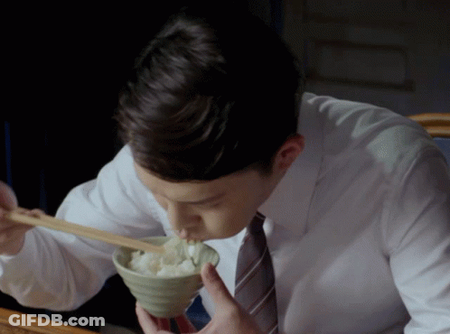 Man Eating Rice From Bowl With Chopsticks GIF