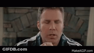 Man Eating Sandwich By Fireplace GIF