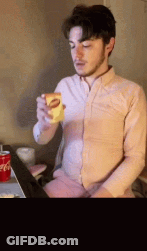 Man Eating Sandwich Drinking Coke GIF