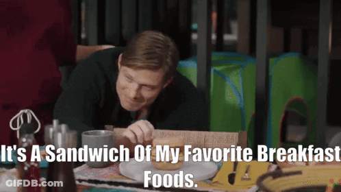Man Eating Sandwich With It's A Sandwich Of My Favorite Breakfast Foods GIF