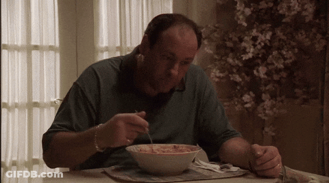 Man Eating Soup At Table GIF