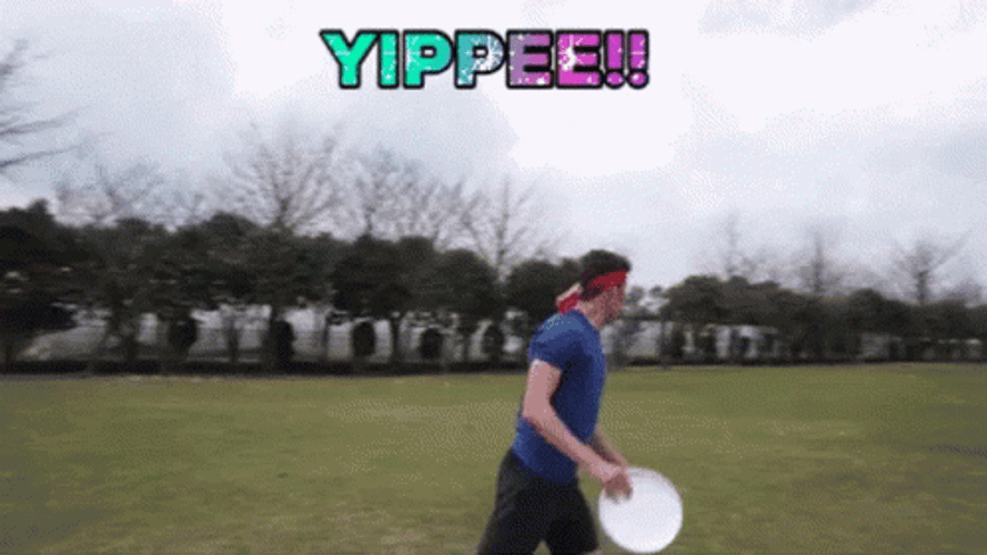 Man Excitedly Playing Frisbee GIF