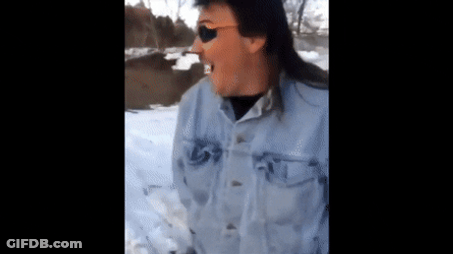 Man Executing A Snowmobile Jump GIF