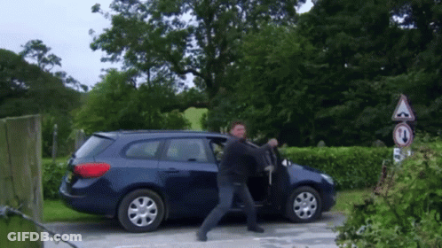 Man Exiting Blue Car With No Turn Sign GIF