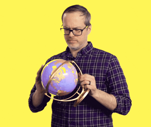 Man Exploring Globe GIF