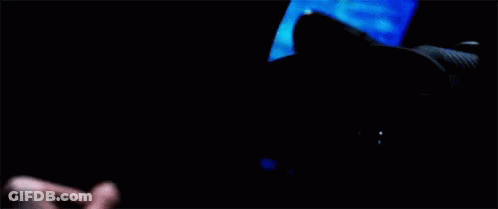 Man Face In Front Of Computer Screen With Letter C GIF