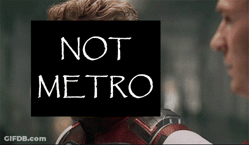 Man Face Obscured By Sign Reading Not Metro GIF