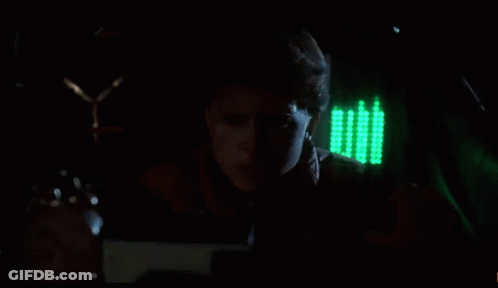 Man Face With Clock Behind GIF