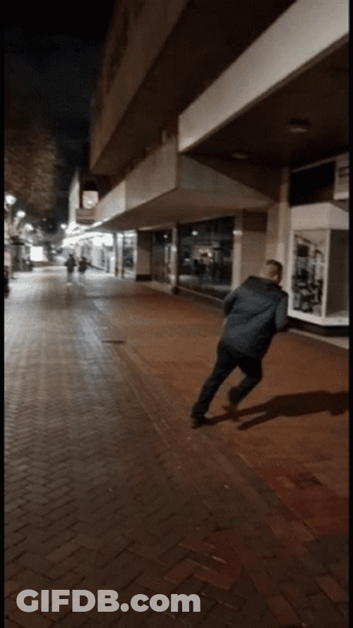 Man Falling Down In The Hallway GIF