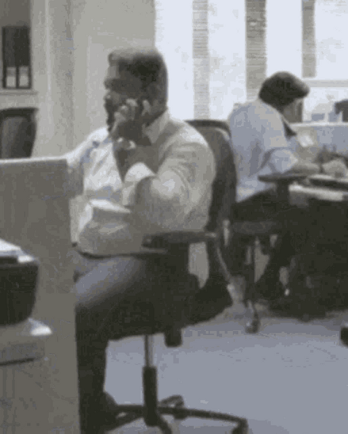 Man Falling Off Chair GIF