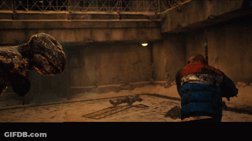 Man Fighting Monster With Netflix Logo GIF