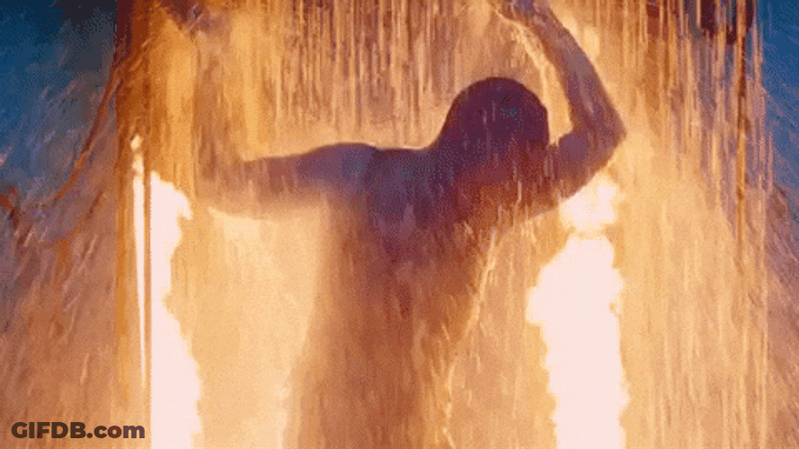 Man Flame On With Water Sprinkler GIF