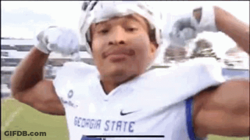 Man Flexing In Georgia State Football Jersey GIF