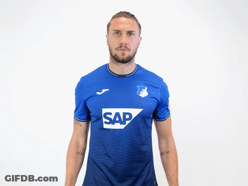 Man Flexing Muscles In Blue Shirt Saying Sap GIF