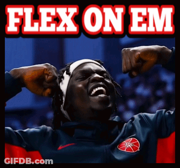 Man Flexing Muscles With Flex On Em Sign GIF