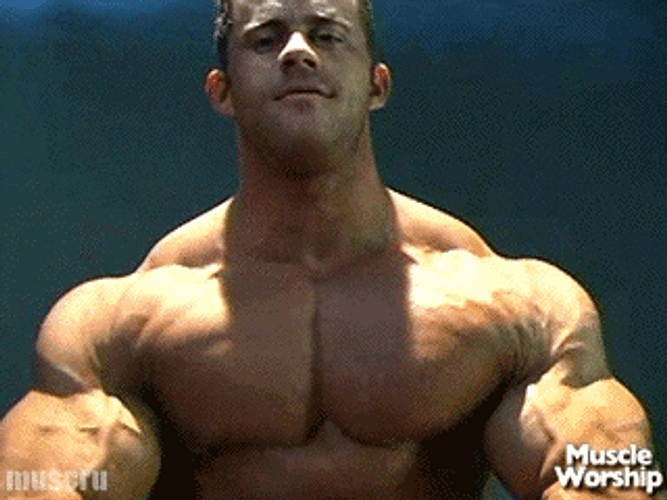 Man Flexing Upper Body Muscle Growth GIF