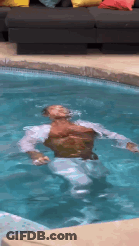Man Floating On His Back In Pool GIF
