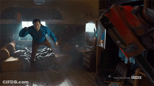 Man Flying Holding Chainsaw Ash Vs Evil Dead GIF
