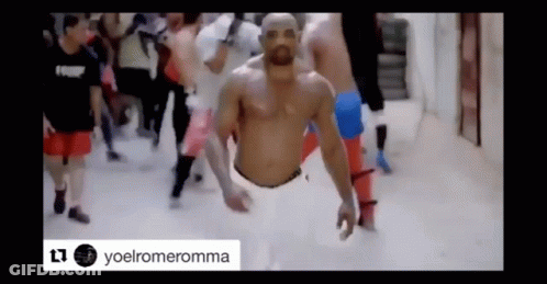 Man Flying Shirtless In Front Of Crowd GIF