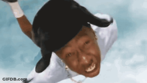 Man Flying Through Air In Baseball Cap GIF