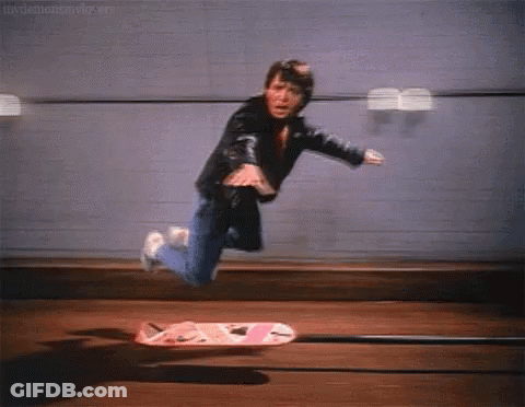 Man Flying Through Air Riding Skateboard GIF
