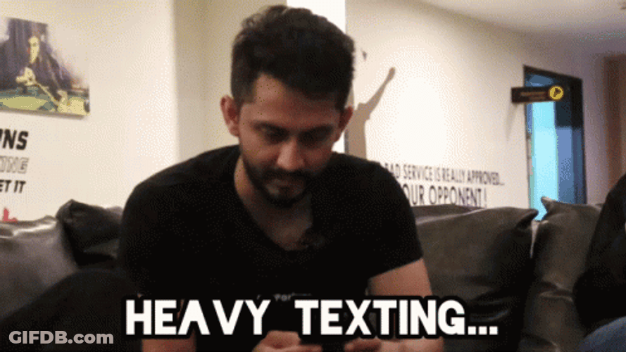 Man Focused On Heavy Texting GIF
