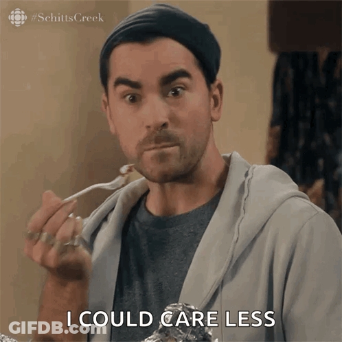 Man From Schitt's Creek Saying I Could Care Less While Eating GIF