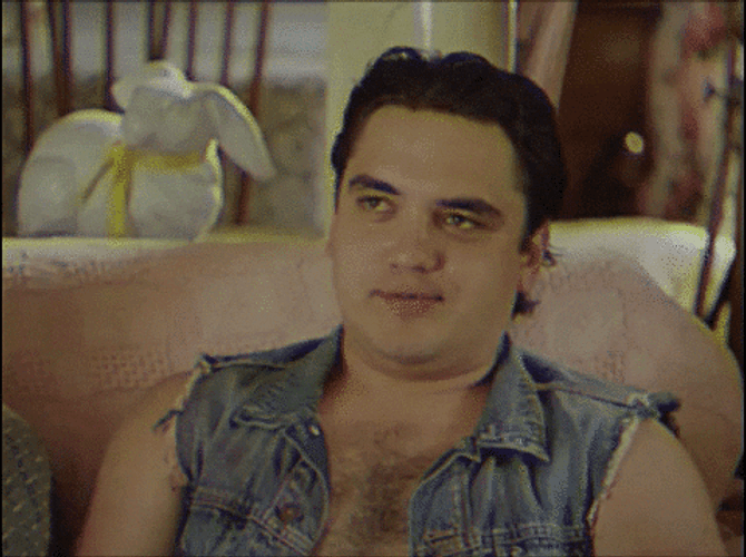 Man Frustrated Eye Rolling Eating Popcorn Meme GIF