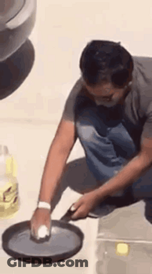 Man Fry Pan Egg Outside Hot Weather GIF