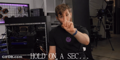 Man Gesturing Saying Hold On A Sec GIF