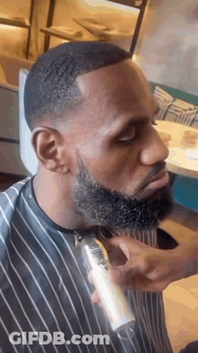 Man Getting Beard Trimmed By Barber GIF