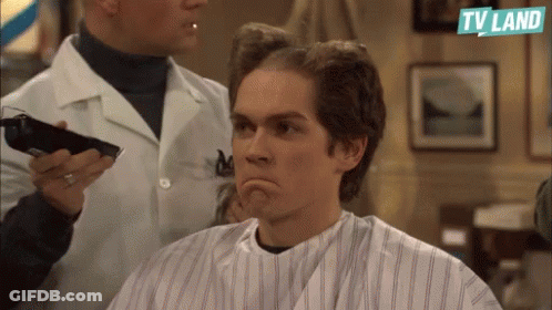 Man Getting Haircut At Barber Shop With TV Land Logo GIF