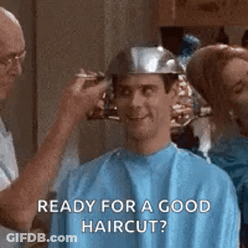 Man Getting Haircut By Barber In Blue Cape GIF