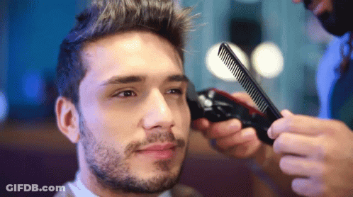 Man Getting Haircut By Barber With Comb GIF