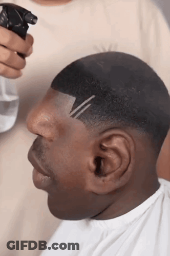 Man Getting Haircut Spray Bottle GIF