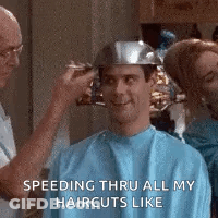 Man Getting Haircut While Wearing Helmet GIF
