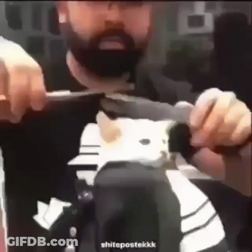 Man Getting Haircut While Wearing Helmet GIF