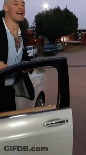 Man Getting Out Of Car With Door Open GIF