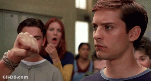 Man Giving Fist Bump In Front Of Crowd GIF